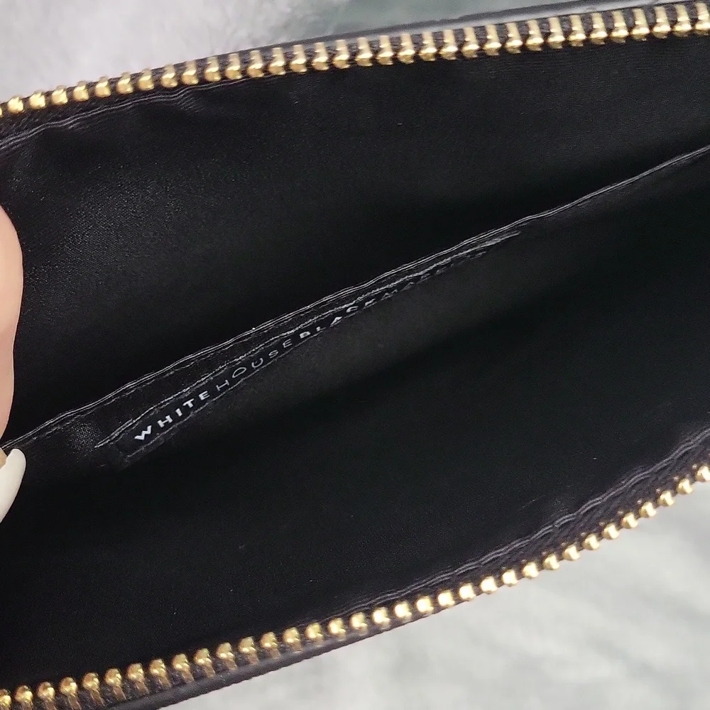 White House Black market Floral clutch